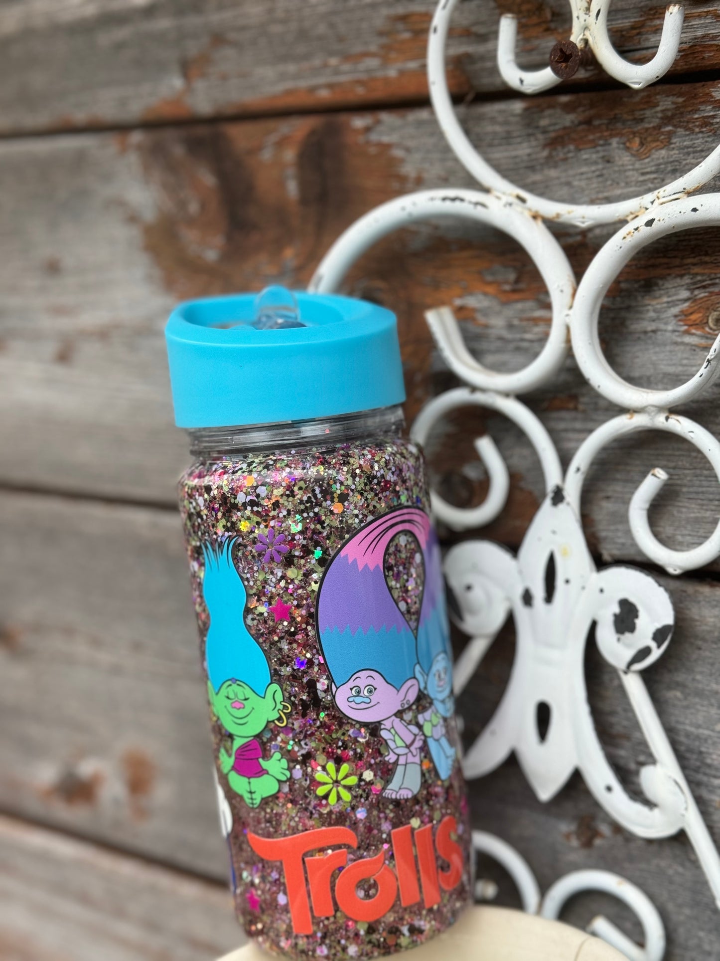 Trolls 10oz bottle with blue lid
