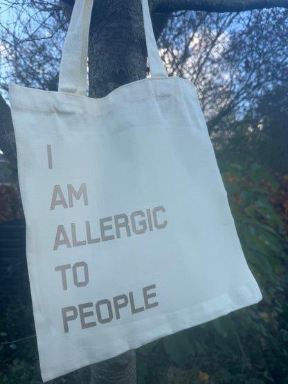 I’m allergic to people tote bag